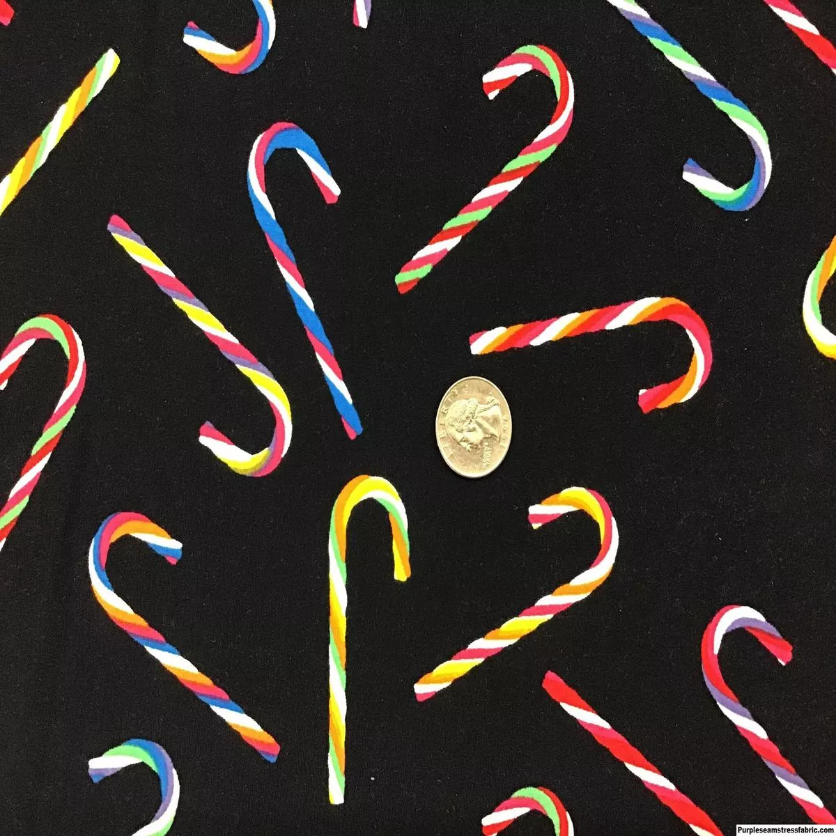 Candy canes on black double brushed poly spandexFabric